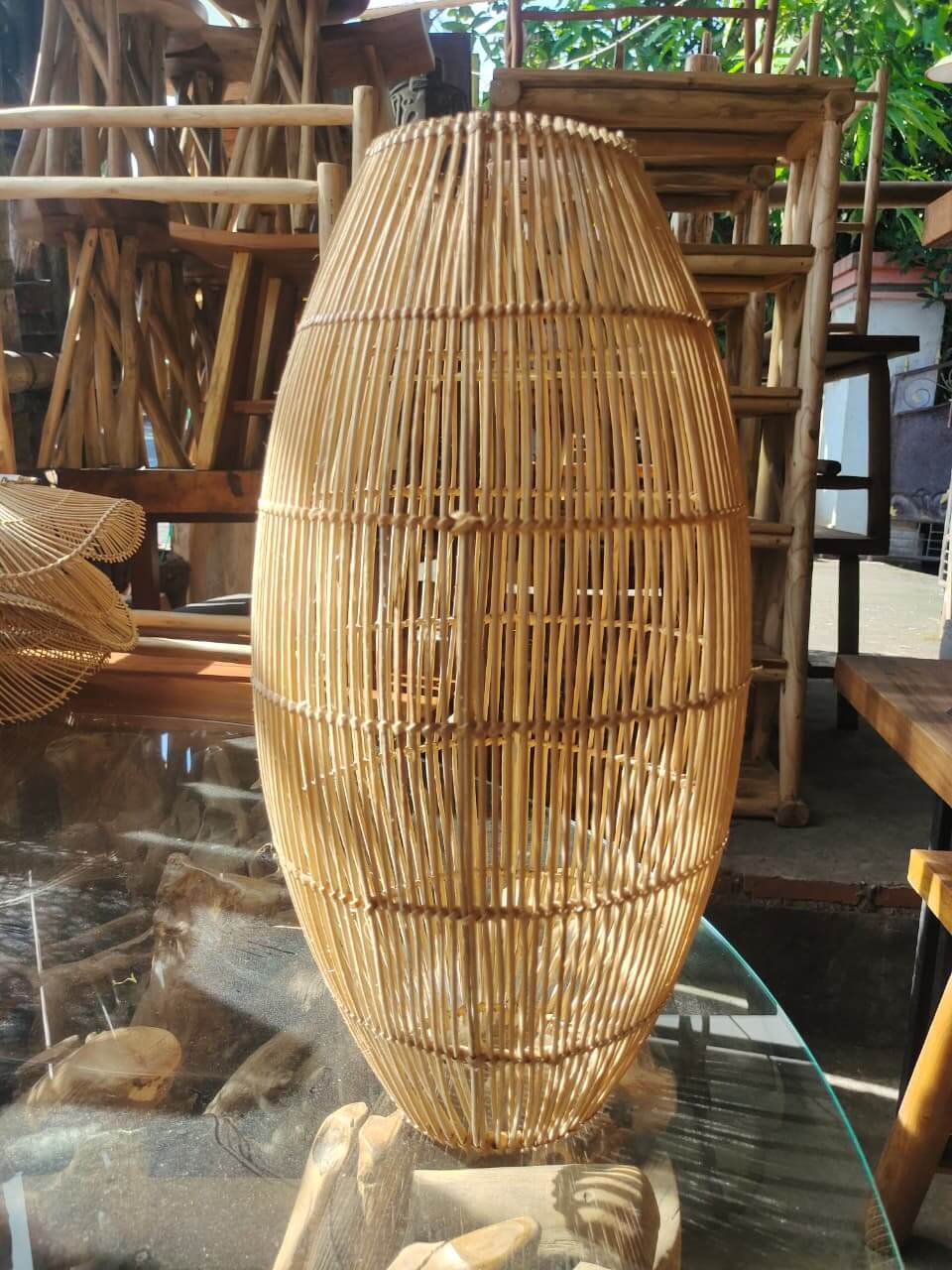Sleek oval handmade rattan lampshade with vertical weave and horizontal rings