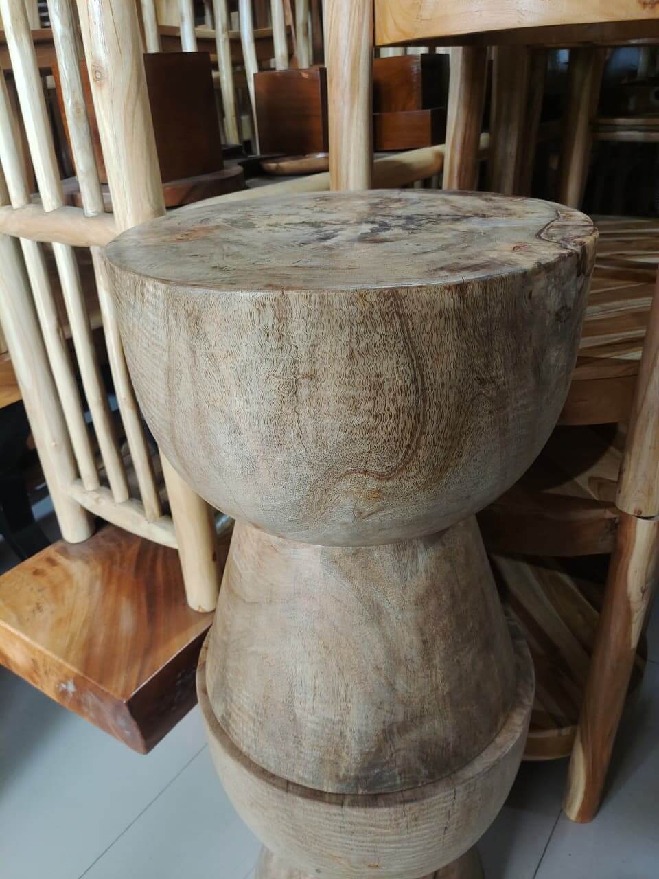 Stool A solid wood stool with minimalist design and natural wood grain