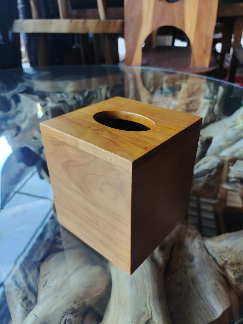 Natural wooden tissue box in cube shape with minimalist oval opening